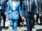 Brigitte Macron en tailleur pantalon bleu