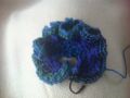 Une broche en fleur au tricot