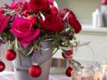 Art floral : un bouquet de roses et rameaux d'olivier pour Noël