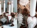 Un centre de table de Noël : une couronne décorée de papiers
