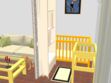 Une chambre de bébé dans un salon