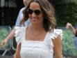 Pippa Middleton affiche son baby-bump dans une sublime robe longue en dentelle blanche