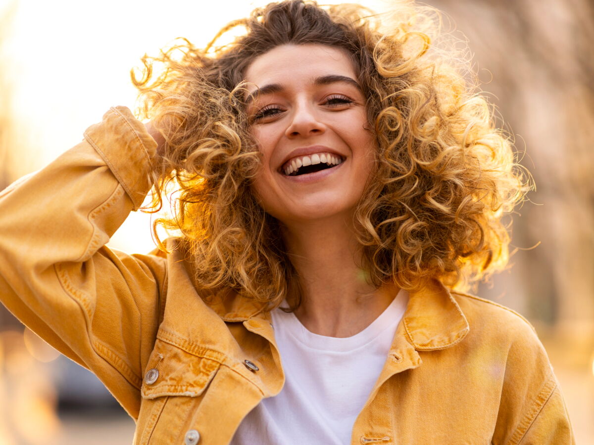 how to smile in a picture