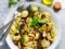Salade d'orecchiette aux tomates séchées, olives, courgettes grillées et pignons 
