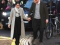 Le prince Harry, prévenant envers sa compagne Meghan Markle, quittent la station de radio "Reprezent" dans le quartier de Brixton, à Londres, le 9 janvier 2018.