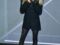 Pamela Anderson "sans pantalon" en total look noir pailleté glamour 