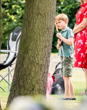 Le prince George intrigué par le match de polo de son père, le prince William, dans le Berkshire, juillet 2019
