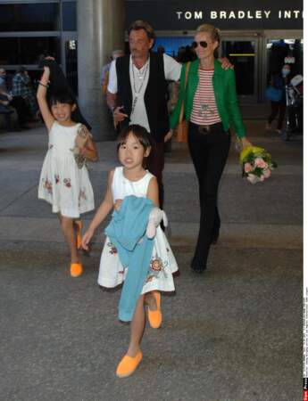 Johnny et Laeticia Hallyday avec leurs filles Jade et Joy 