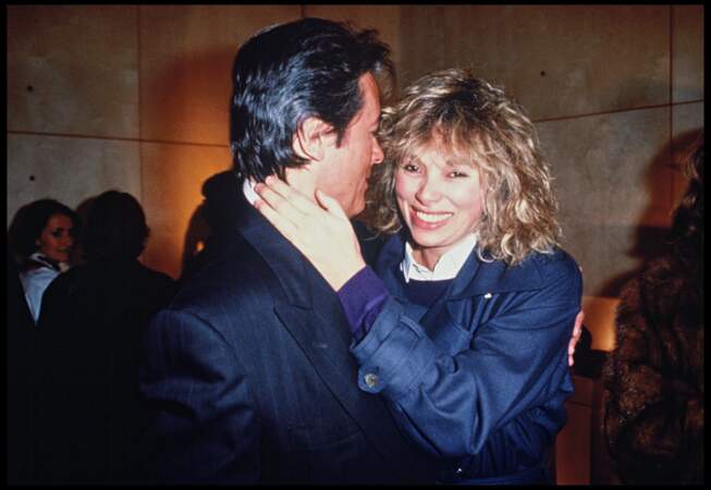 Alain Delon et Mireille Darc lors d'une soirée collection Bugatti en janvier 1989.