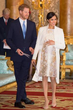 Le prince Harry et Meghan Markle enceinte lors de l'investiture du prince de Galles à Londres, le 5 mars 2019