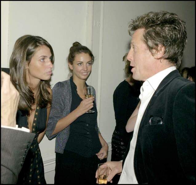 Marina Hanbury, her sister Rose Hanbury and Hugh Grant attend a dinner party in London on September 26, 2007.