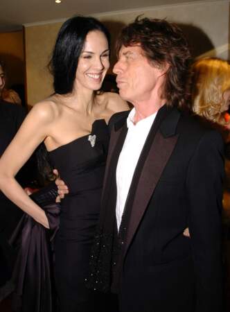 Mick Jagger et sa compagne L'Wren Scott à la première de "Alfie" à Londres le 14 octobre 2004.