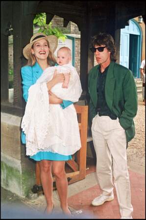 Mick Jagger et Jerry Hall avec leur fille Georgia May en 1996.