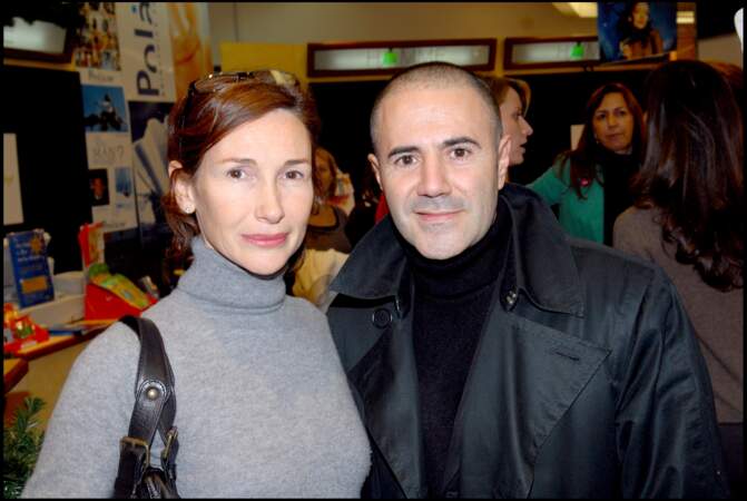 José Garcia et sa femme Isabelle Doval à la soirée des "Petits anges portes bonheur"à Paris le 18 décembre 2006.