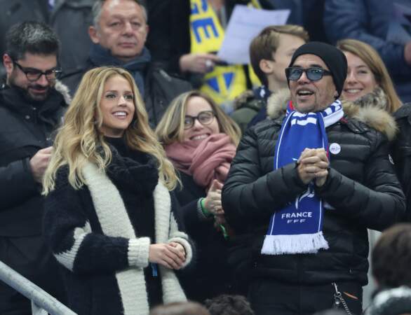 Avec sa femme Julie Hantson pendant le match de qualification de la coupe du monde de football 2018, France vs Suède au Stade de France 

