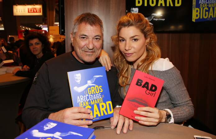 Jean-Marie Bigard et sa femme Lola Marois  lors du salon du livre de Paris le 17 Mars 2018 à la Porte de Versailles de Paris.