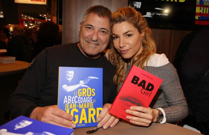 Jean-Marie Bigard et sa femme Lola Marois  lors du salon du livre de Paris le 17 Mars 2018 à la Porte de Versailles de Paris.