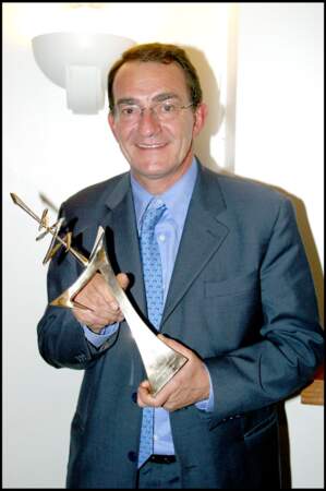 Le journaliste reçoit également le 7 d'Or du meilleur présentateur du JT, le 3 novembre 2003. Il en aura reçu 4 dans toute sa carrière.