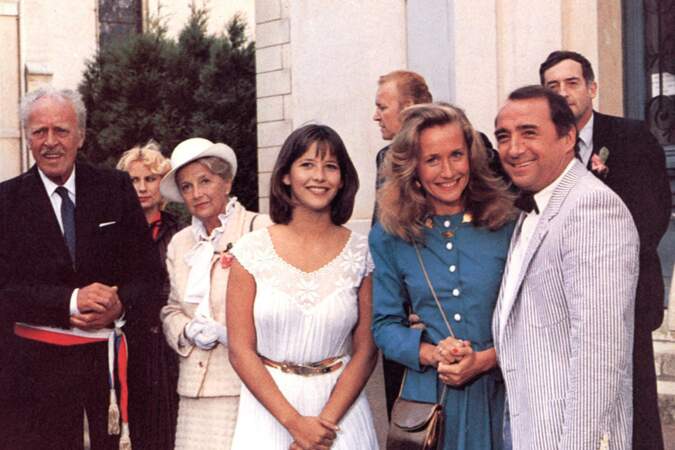 Sophie Marceau, Brigitte Fossey et Claude Brasseur sur le tournage du film "La boum 2", en 1982.