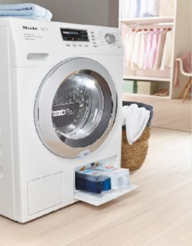 Innovation dans la maison : La praticité du meuble lave-linge séchant  vertical 