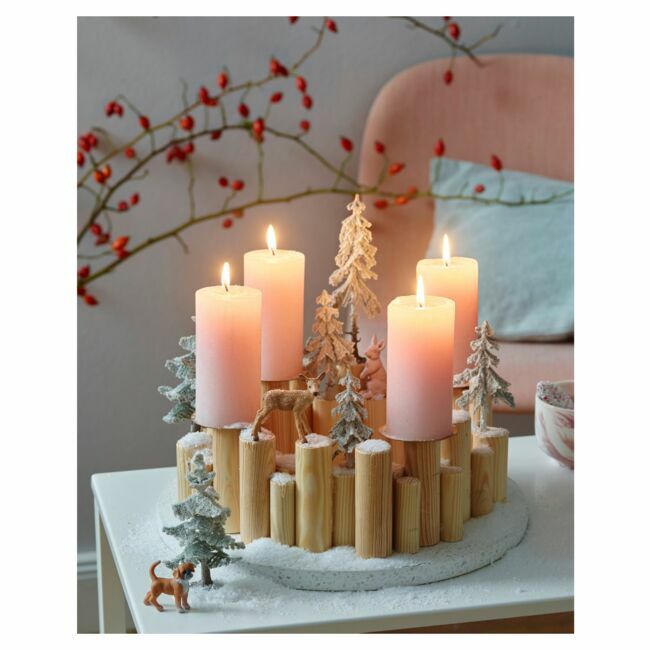 Centres de table Noël à base de bougies pour réchauffer l'atmosphère