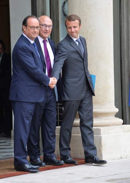 François Hollande, président de la République, Michel Sapin, ministre des Finances et des Comptes publics et Emmanuel Macron, ministre de l’Economie, de l’Industrie et du Numérique lors de la sortie du conseil des ministres du nouveau gouvernement, au palais de l'Elysée à Paris, le 27 août 2014.