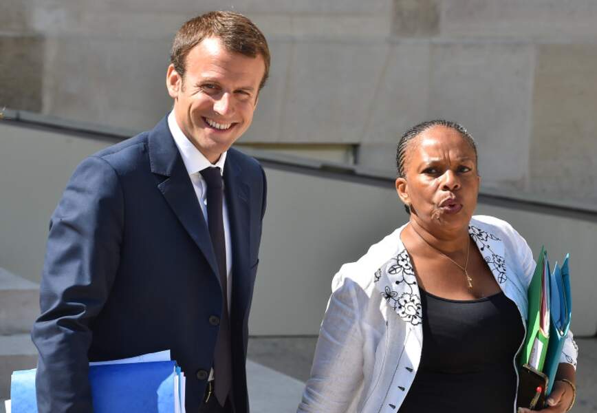 Emmanuel Macron, ministre de l’Économie, de l’Industrie et du Numérique et Christiane Taubira, garde des Sceaux, ministre de la Justice lors de la sortie du conseil des ministres de la rentrée, au palais de l'Elysée à Paris, le 19 août 2015.