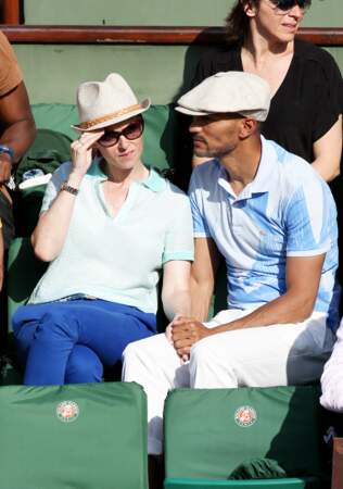 Audrey Fleurot et son compagnon Djibril Glissant assistent à la finale dame lors des Internationaux de France de tennis de Roland Garros à Paris le 7 juin 2014