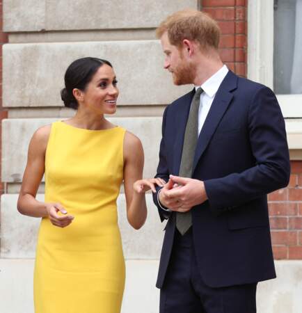Un mariage royal qui implique certaines obligations : la duchesse et le duc de Sussex assistent à la réception du "Your Commonwealth Youth Challenge", au Marlborough House, à Londres, le 5 juillet 2018.