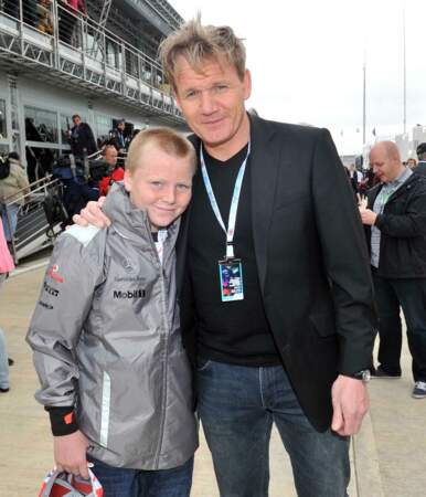 Le chef aux côtés de son fils Jack Scott, au Grand Prix de Formule 1 de Silverstone, à Londres, le 8 juillet 2012.