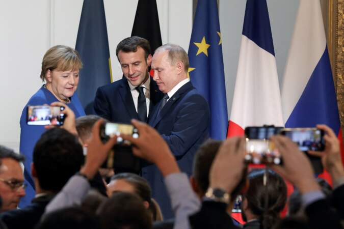 Vladimir Poutine, Angela Merkel et Emmanuel Macron