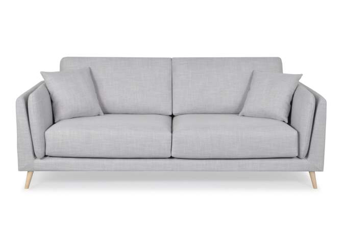 Un canapé en tissu gris clair 