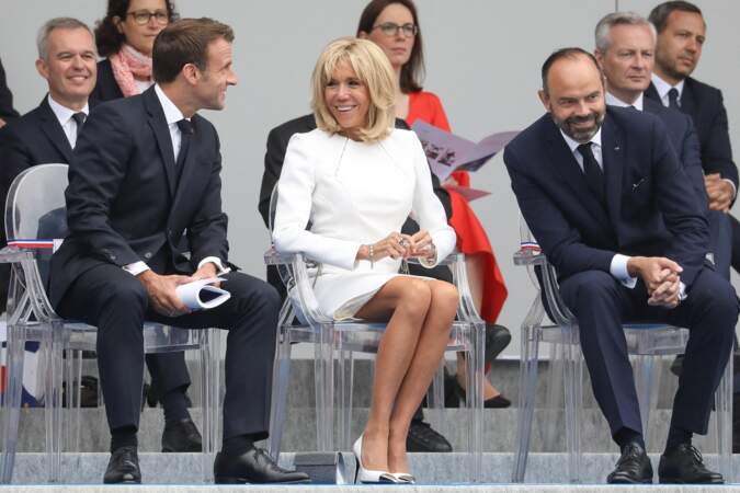 Emmanuel Macron, président de la République Française, et sa femme Brigitte Macron, Edouard Philippe, Premier ministre, lors du 139ème défilé militaire du 14 juillet sur les Champs-Elysées, jour de la Fête Nationale, à Paris, le 14 juillet 2019.